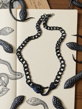 Chunky Black Three Eyed Snake Necklace Glass and Stainless Steel